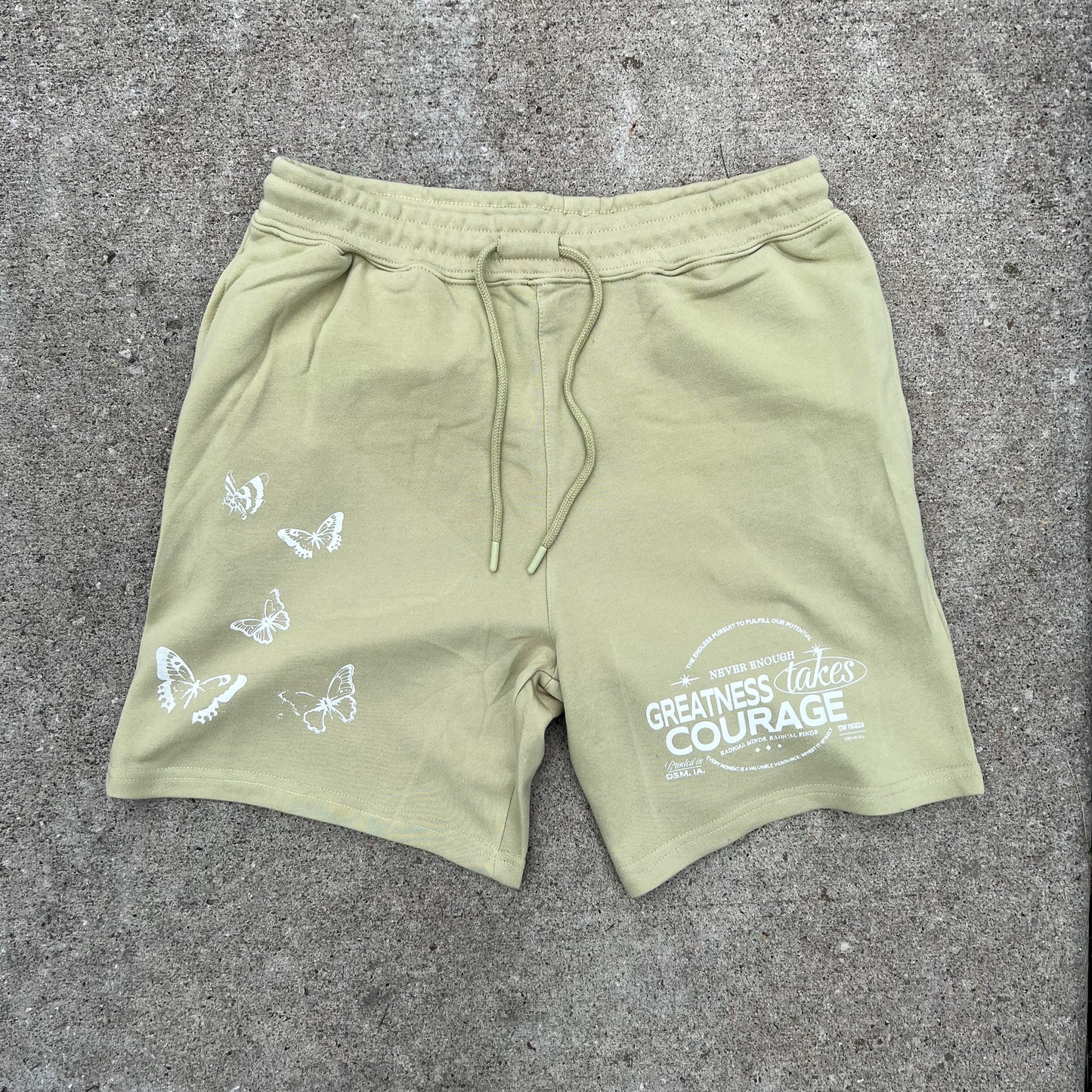 GREATNESS TAKES COURAGE SHORTS