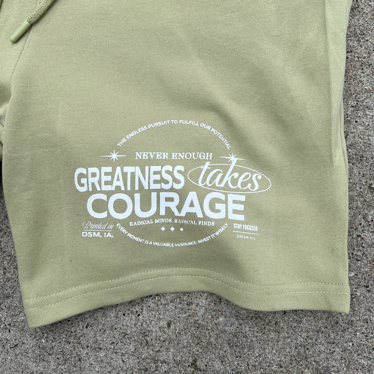 GREATNESS TAKES COURAGE SHORTS